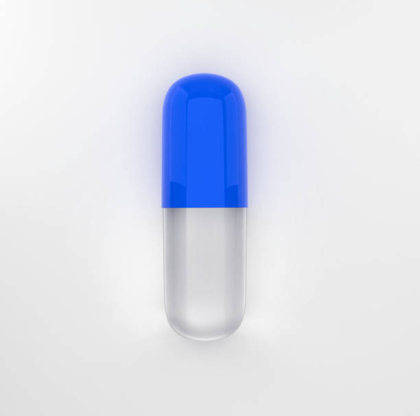 istock Empty blue and glass capsule, medical pill isolated on white 1695103741