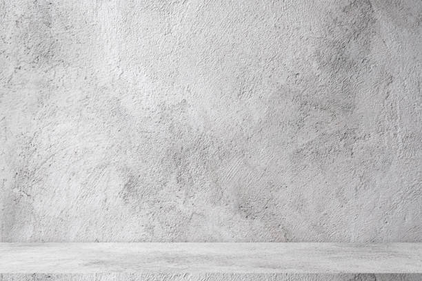 istock The counter cement shelf displays products gray Backdrops and backgrounds inside a blank studio  with shadow and a white bottom with shadow. Modern luxury product display shelves 1695116329