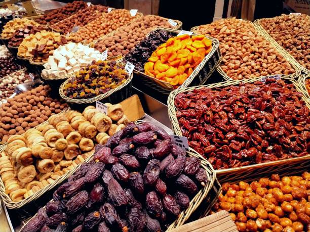 istock Nuts, peanuts, pistachios seeds dry nuts displayed in local market fresh air 1695124520