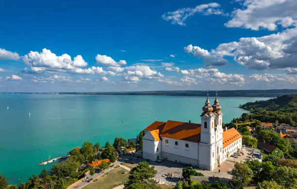 Tihany, Hungary - Aerial panoramic view of the famous Benedictine Monastery of Tihany (Tihany Abbey) with beautiful colourful Lake Balaton at background. High quality photo