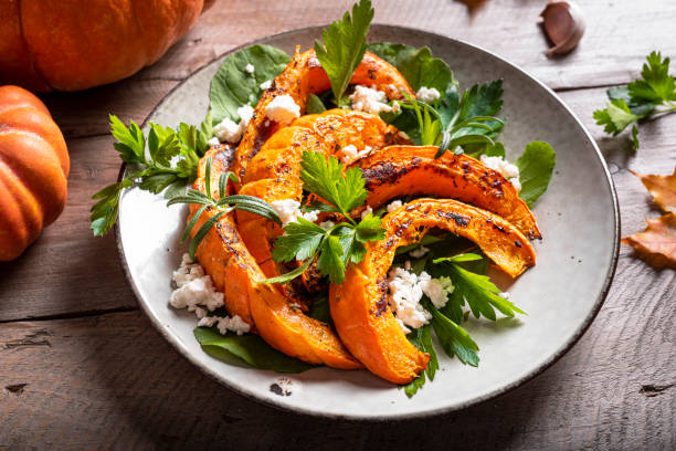 istock Autumn salad with grilled pumpkin and goat cheese 1695157903