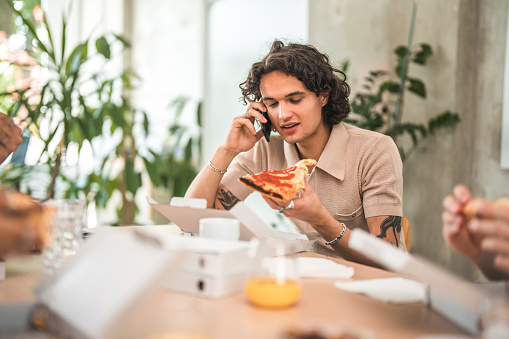 Midday retreats are a Gen Z tradition, with pizza as the centerpiece and connection as the outcome, enhancing their sense of belonging and workplace satisfaction.