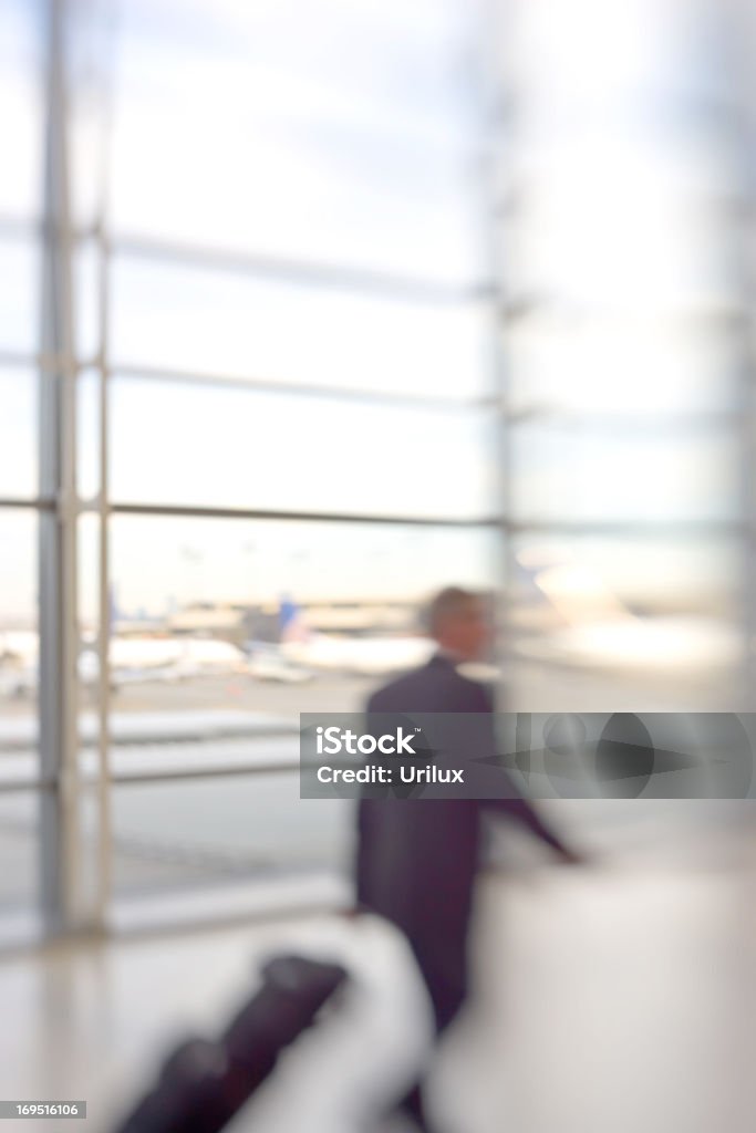 Airport - motion blurred business people At the airport - blurred business people Adult Stock Photo