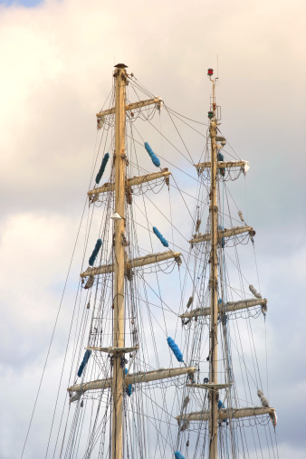 A telephoto of an old, tall sailing boat