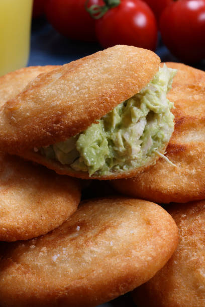 istock Arepa stuffed with chicken and avocado 1695168616