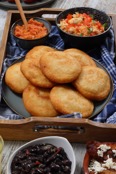 istock Arepa stuffed with chicken and avocado 1695168619