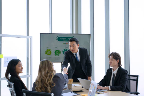 istock White collar workers are meeting at office. 1695193924