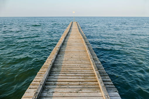 Pier Beach of Lido di Jesolo at adriatic Sea in a beautiful summer day Italy