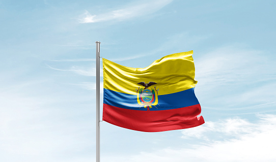 Ecuador national flag waving in beautiful sky.