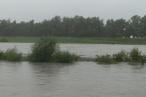 Diepoldsau, Switzerland, August 28, 2023 Heavy flood at the rhine river during a severe rain shower