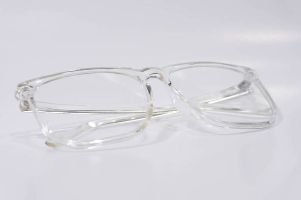 istock Clear glasses, both lenses and frames, on a white background. 1695354683