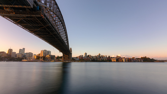 A beautiful evening in Sydney, and this is the view looking northwards from beneath the city's iconic Harbour Bridge.