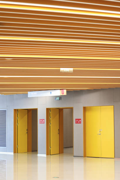 istock Interior of office building with yellow wall 1695376657