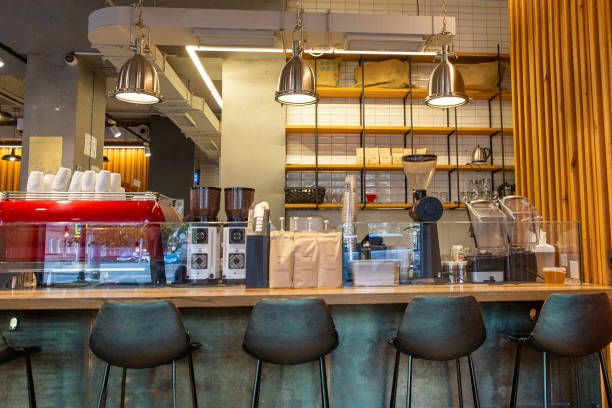 istock Restaurant kitchen without people. There is no one in kitchen of cafe. Concept - work in restaurant has been stopped. Small restaurant kitchen with chrome equipment. 1695391906