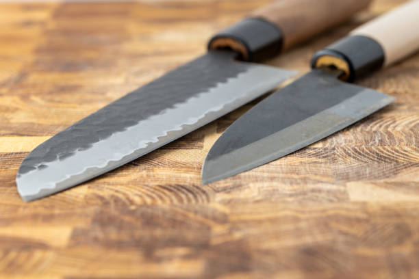 istock Japanese premium knives released.Damascus steel pattern.Background with a pattern of Damascus steel. 1695415264