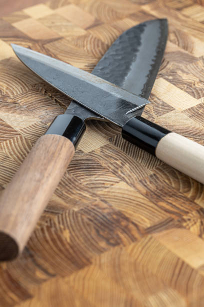 istock Japanese premium knives released.Damascus steel pattern.Background with a pattern of Damascus steel. 1695415268