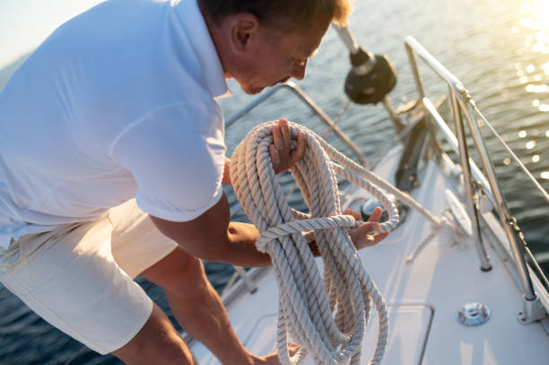 istock Man on a yacht getting ready for traveling 1695439909