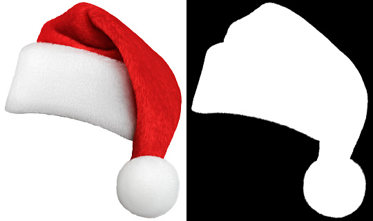 Excited young african man with santa hat. Afro american man with santa hat and looking at camera and laughing on gray background.