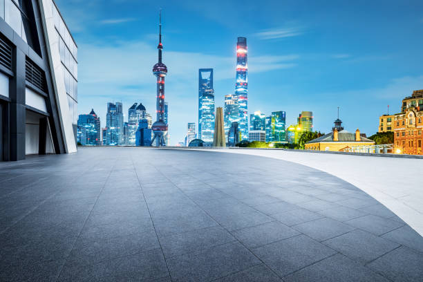 istock Shanghai city skyline and square floor at night 1695460339