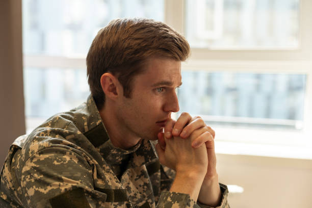 istock a military man in his thoughts 1695484035