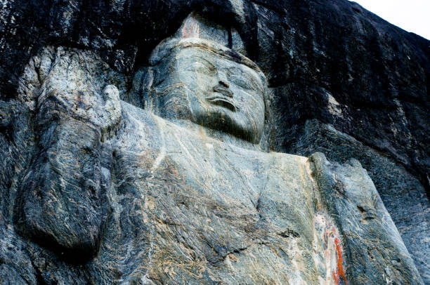 istock Buduruwagala is an ancient buddhist temple in Sri Lanka. 1695499332