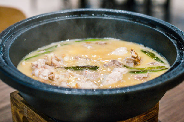 istock Tagine Bake Kampong Chicken - chicken baked in a clay tagine 1695528606