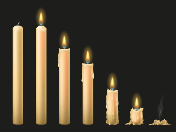 istock Set of candles on a dark background. From unlit to burnt out. 1695529329