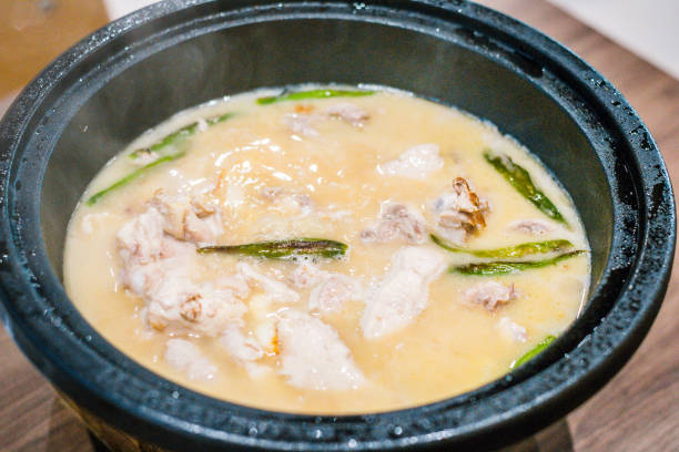 istock Tagine Bake Kampong Chicken - chicken baked in a clay tagine 1695536373