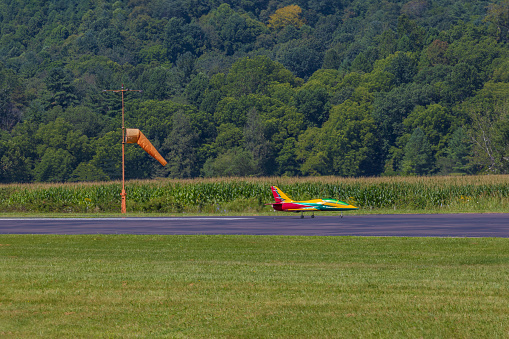 Mountain City, Tennessee: August 26, 2023: Radio Control jets doing take offs, aerobatic maneuvers and landings during the Jet Precision Aerobatic National Championship at Mountain City Airport in Tennessee.