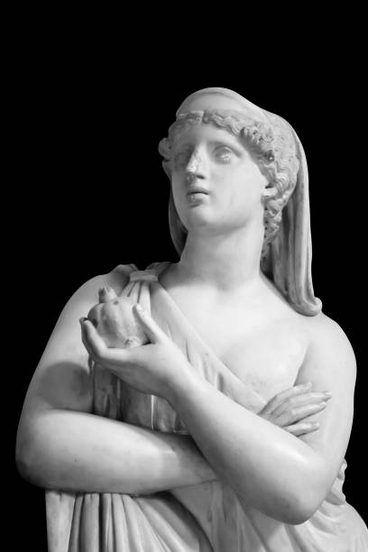 istock Ancient statue of Goddess Persephone with pomegranate. 1695568465