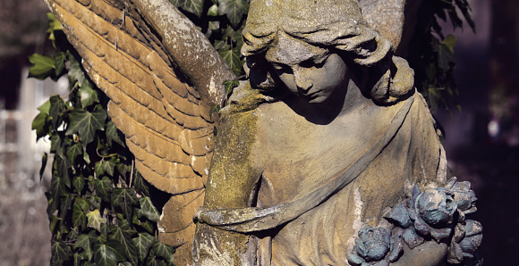 Figure of angel as a symbol of love, kindness, and suffering