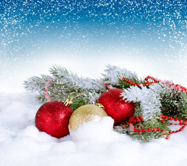 istock Christmas card with sparkle balls and spruce 1695569674