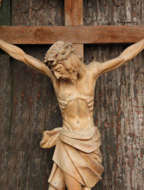 istock Holy cross with crucified Jesus Christ 1695570277