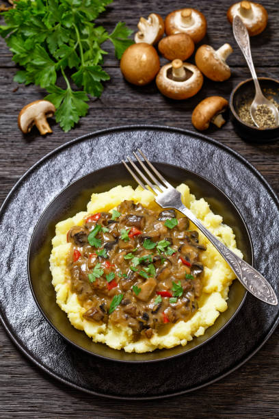 istock potato mash topped with mushroom gravy in bowl 1695575886