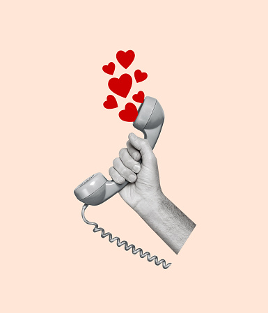 Creative modern art collage of a hand holding a retro phone and hearts. Modern design. Holidays and love concepts. Women's Day, Valentine's Day. Greeting card. Copy space.