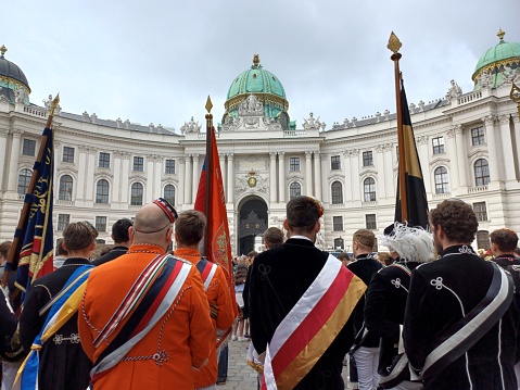 Vienna, Austria - June 8, 2023: An outdoor prayer meeting of Catholics during the day Feast of Corpus Christi in front of Hofburg palace.