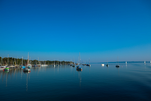 sailboats on lake ammer, bavaria, blues sky