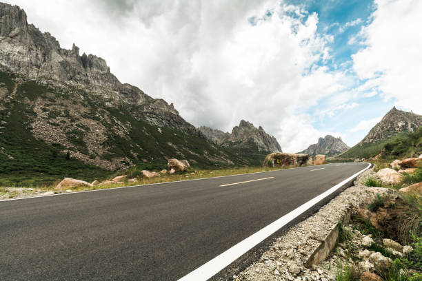 istock Mountain road at Lianbaoyeze, China 1695597420