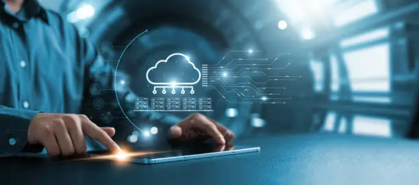 Photo of Businessman using tablet to transfer data on cloud computing, seamless data transfer and strong internet security, server based communication on social networks, servers and storage.