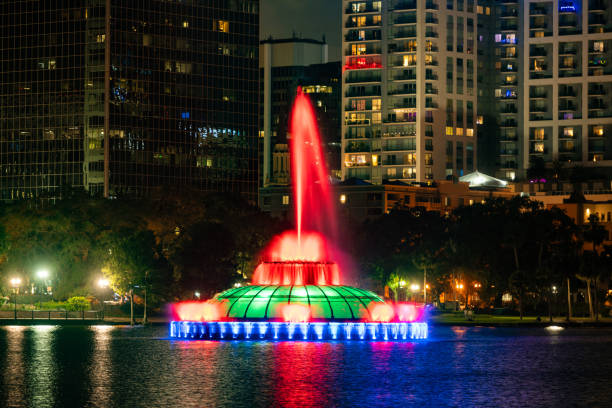 istock Downtown Orlando Cityscape with Lake Eola at Night 1695621766