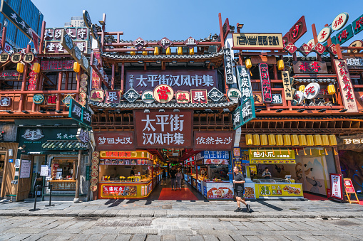 Changsha, China - September 1, 2023: Shops and cafes on pedestrian street