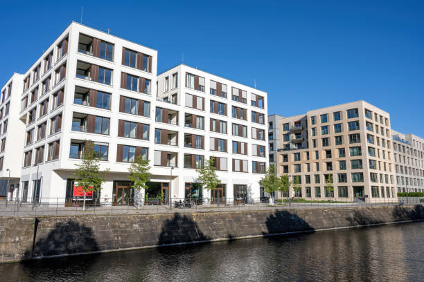 istock Modern apartment buildings at the waters edge 1695679265