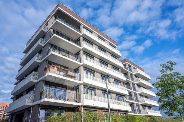 istock Modern apartment building with sunlit balconies 1695679302