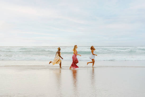 istock multiracial group of women on the beach 1695679830