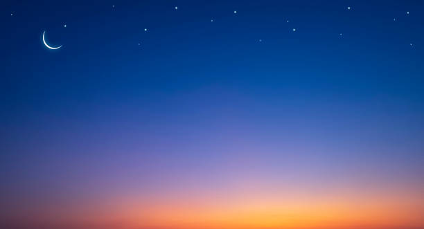 istock Night sky background with crescent moon and stars on colorful romantic twilight sky 1695688766