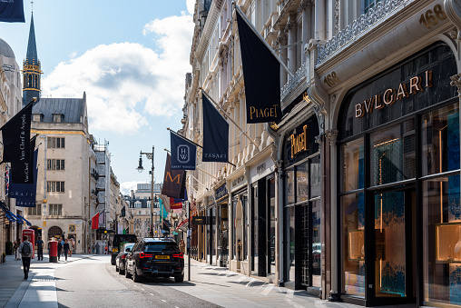 London, UK - August 27, 2023: View of luxurious Bond Street in the West End. It is one of the most expensive and sought after areas of real estate in Europe, with prestigious and expensive shops established along the street