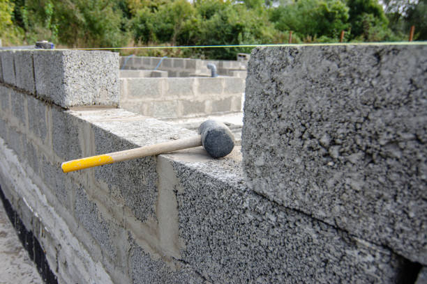 istock Construction of walls from expanded clay concrete blocks 1695694427