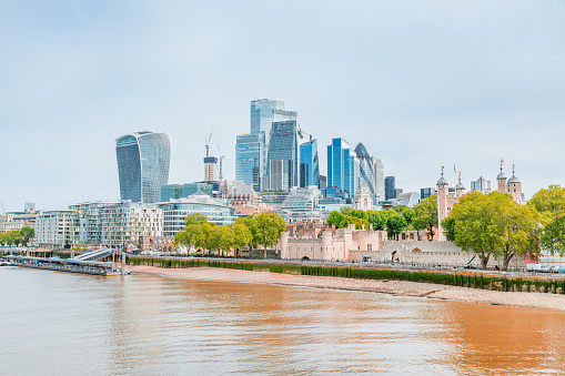 Towers of London financial district skyscrapers overlooking River Thames