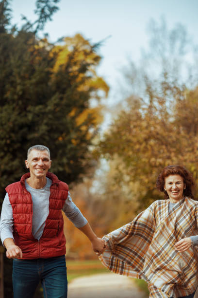 istock happy modern family in park walking 1695738363