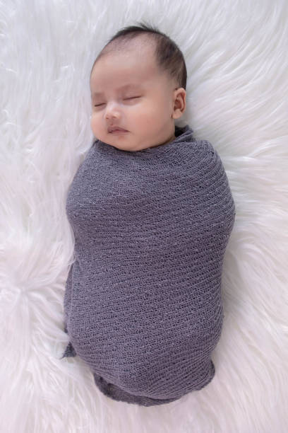 istock Portrait Asian newborn sleeping 1695776382